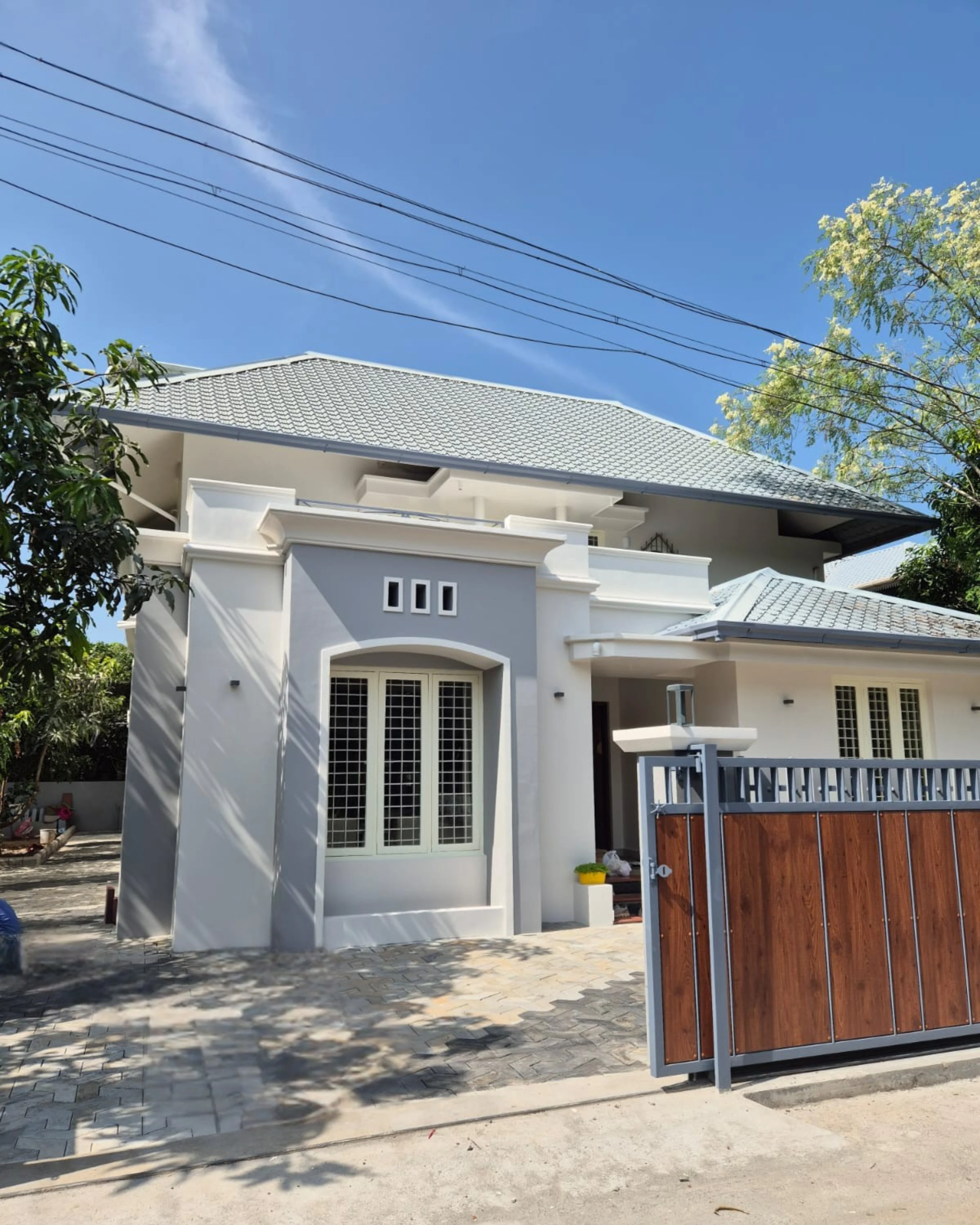 Vaikom backwater resort villa exterior weather proofing painting Kottayam
